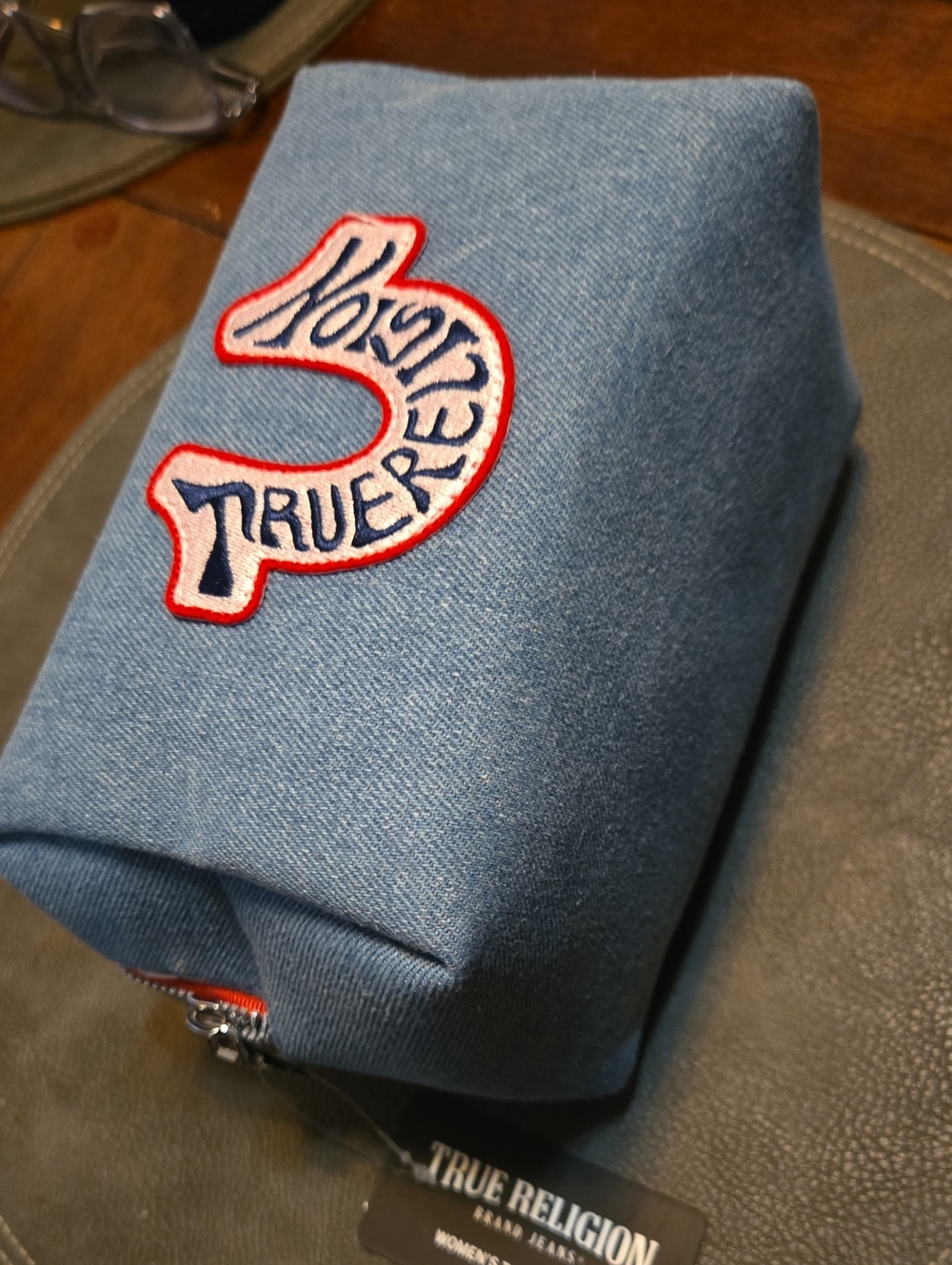 True Religion Light Blue Denim Toiletry Bag with Red and White Patch
